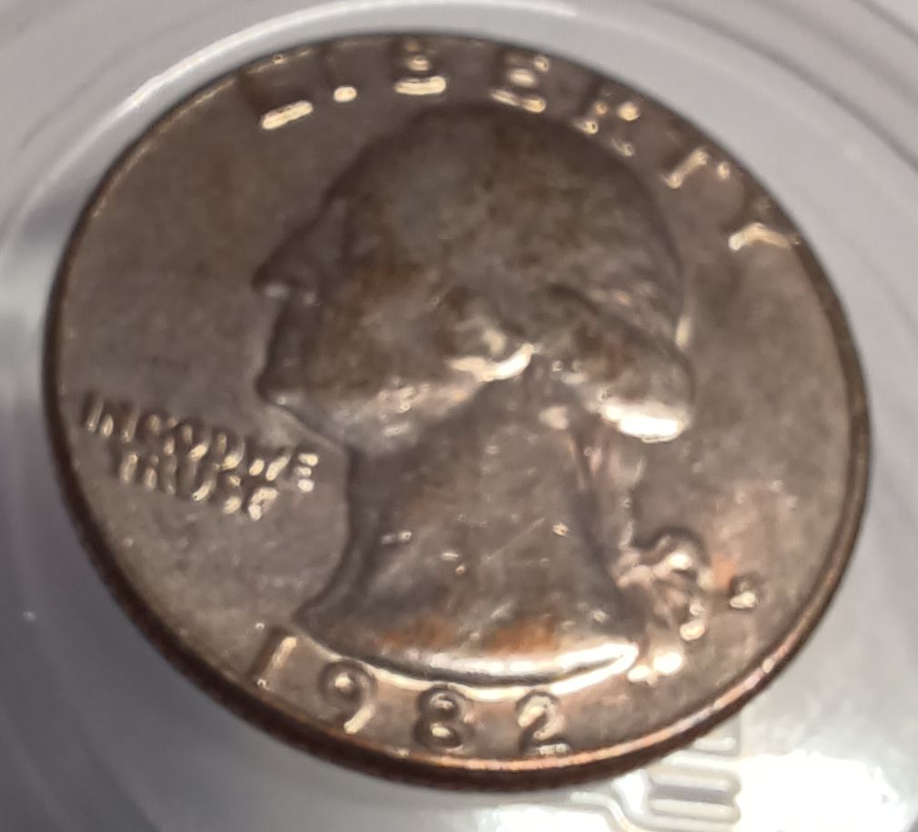 1982-Quarter-With-Copper-Showing-Through-Face.-Cladding-Error?